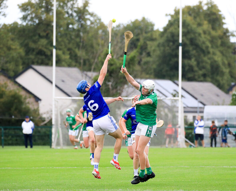 Ballinhassig's Darragh O'Sullivan and Ballincollig's Stephen Wills rise for the dropping ball. Picture: David Creedon Ballinhassig's Darragh O'Sullivan and Ballincollig's Stephen Wills rise for the dropping ball. Picture: David Creedon