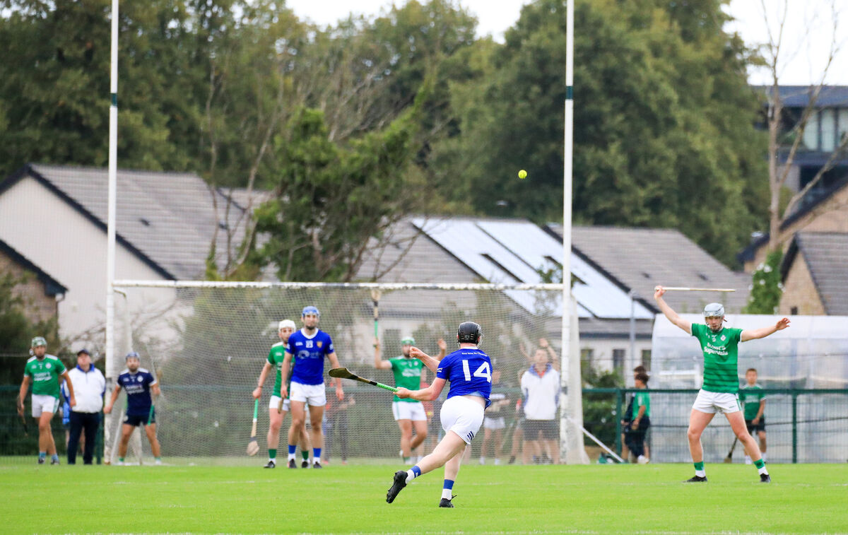 Ballinhassig's Ger Collins scores a point from a free against Ballincollig. Picture: David Creedon