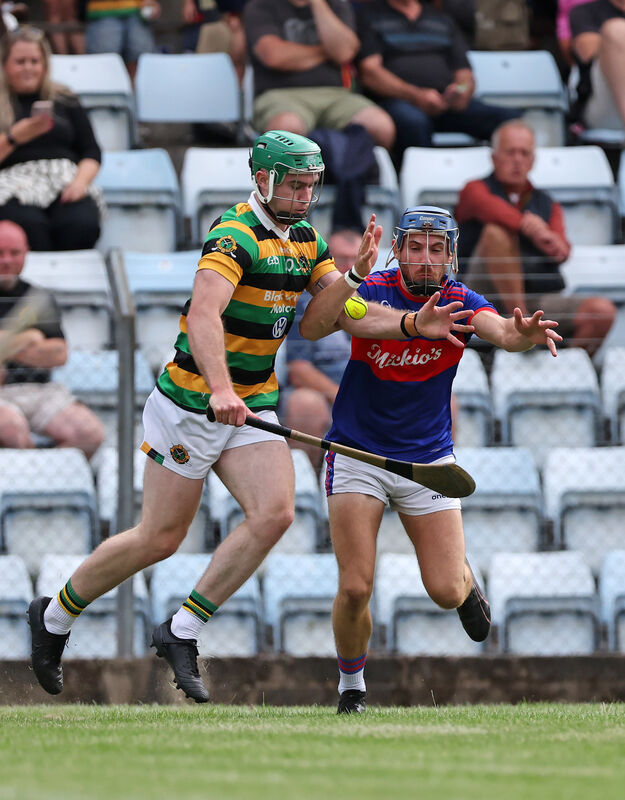  Luke Horgan of Glen Rovers looks to get past Erin's Own's Cormac Dooley. Picture: Jim Coughlan