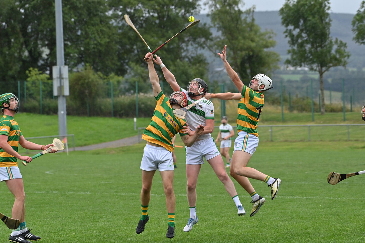  Blackrock's Ryan Sweeney and Robbie Cotter in action against Christopher Mullane of Kanturk. Picture: Dan Linehan