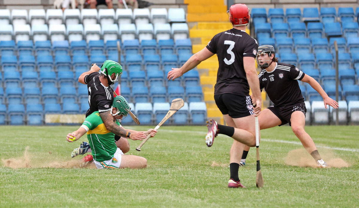 Luke Dineen of Midleton tackles Newtownshandrum's Conor Griffin. Picture: Jim Coughlan Luke Dineen of Midleton tackles Newtownshandrum's Conor Griffin. Picture: Jim Coughlan