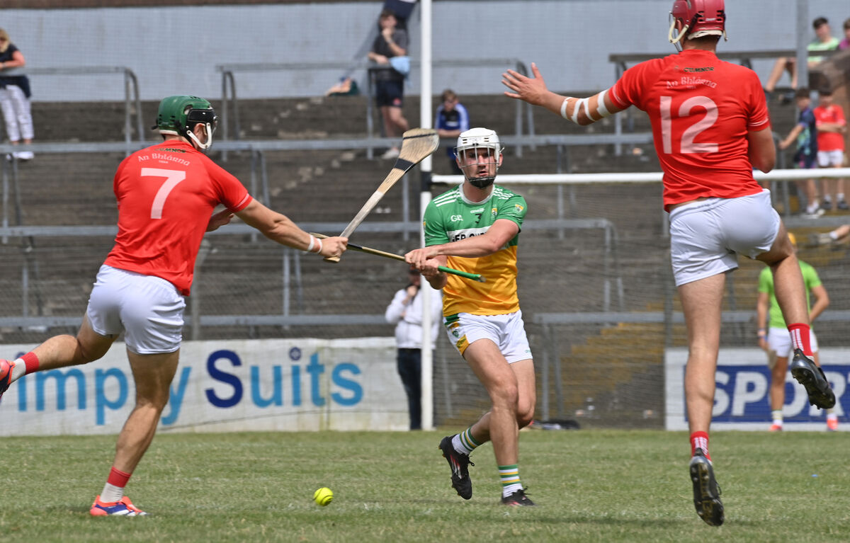 Blarney players Mark Coleman and Eoghan Kirby jumping to block this ball by Eoin Roche of Bride Rovers. Picture: Dan Linehan Blarney players Mark Coleman and Eoghan Kirby jumping to block this ball by Eoin Roche of Bride Rovers. Picture: Dan Linehan