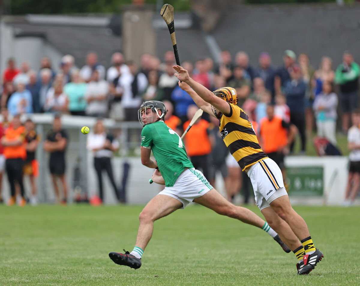 Cian Buckley, Na Piarsaigh, tries to block Ben Walsh, Killeagh. Picture: Jim Coughlan. Cian Buckley, Na Piarsaigh, tries to block Ben Walsh, Killeagh. Picture: Jim Coughlan.