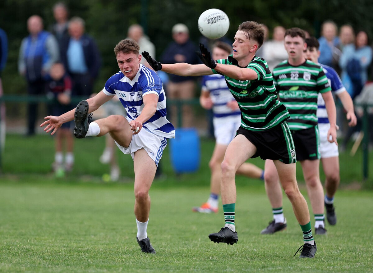  Ben O'Keeffe, Douglas, tries to block Conall Kingston, Kinsale. Picture: Jim Coughlan.