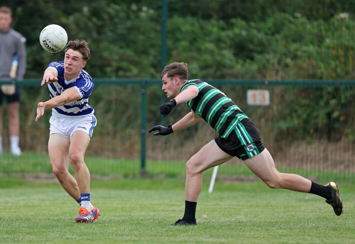  Jack O'Brien, Douglas tries to challenge Aaron Keane, Kinsale. Picture: Jim Coughlan.