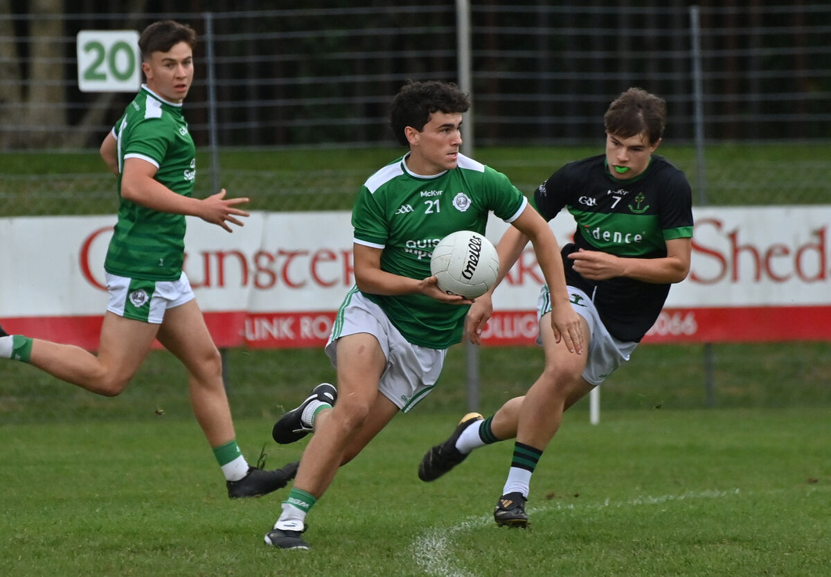  Joe Miskella, Ballincollig, breaks past Adam Quinlivan of Nemo Rangers in their Rebel Óg P1 MFC match at Ballincollig. Picture: Dan Linehan