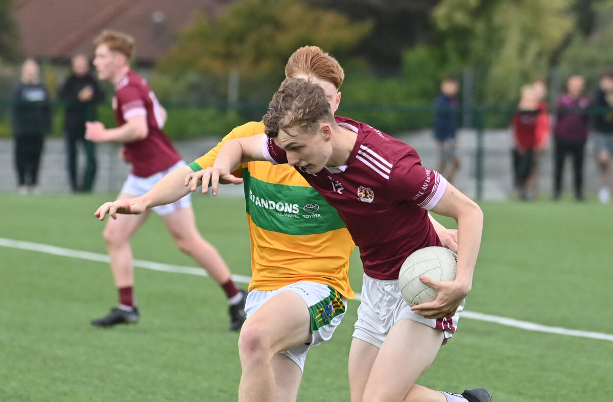 Alex Collins, Bishopstown holding off Rian Boyle. Picture Dan Linehan Alex Collins, Bishopstown holding off Rian Boyle. Picture Dan Linehan