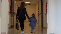 Mother and daughter walking