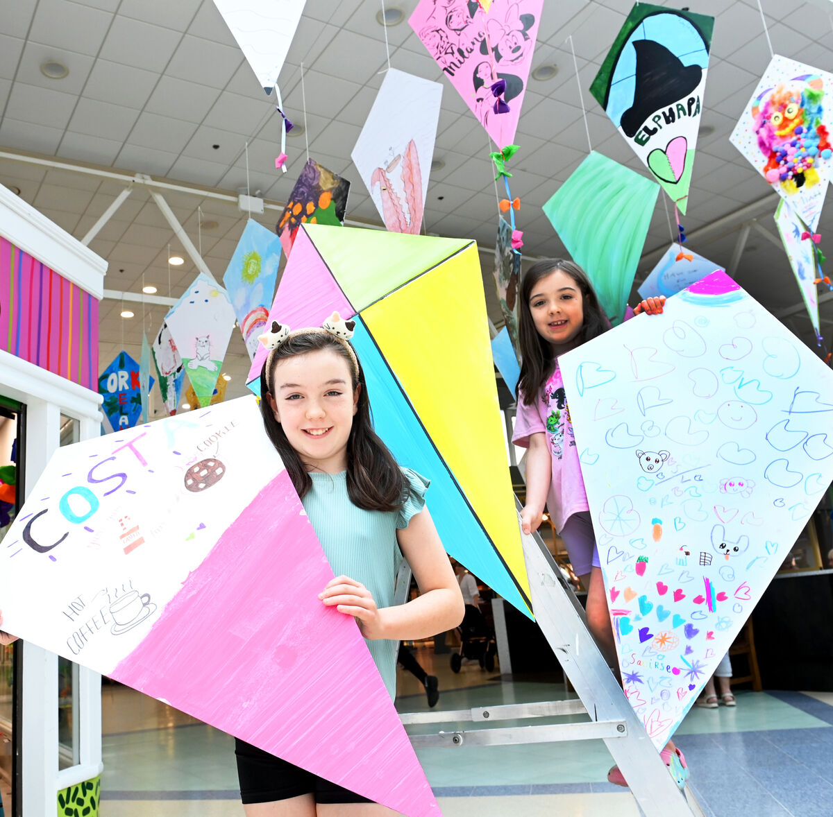 Sisters Aoife and Saoirse O'Callaghan at the Kite Festival HQ at Douglas Court Shopping Centre. Sisters Aoife and Saoirse O'Callaghan at the Kite Festival HQ at Douglas Court Shopping Centre.