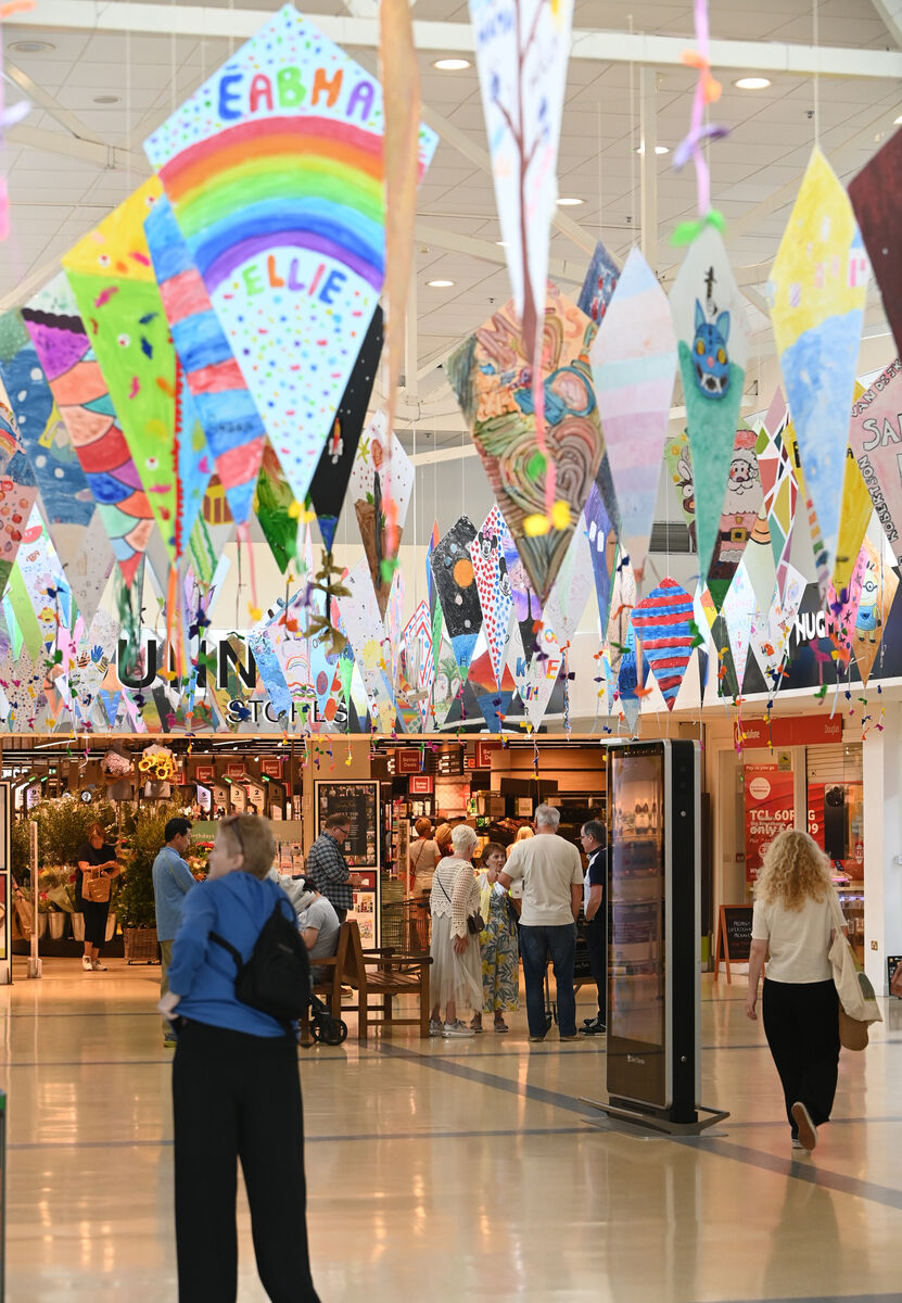 Approximately 1,000 hand-decorated kites are hanging from the roof at the shopping centre. Approximately 1,000 hand-decorated kites are hanging from the roof at the shopping centre.