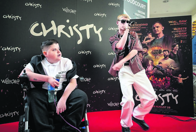 Jamie and Tiny from the Kabin Studio performing on the red carpet at the premiere of the Irish film Christy at the Omniplex at Mahon Point Shopping Centre. The performance added a powerful local voice to a red carpet celebration of community and creativity. Picture: Chani Anderson
Jamie and Tiny from the Kabin Studio performing on the red carpet at the premiere of the Irish film Christy at the Omniplex at Mahon Point Shopping Centre. The performance added a powerful local voice to a red carpet celebration of community and creativity. Picture: Chani Anderson
