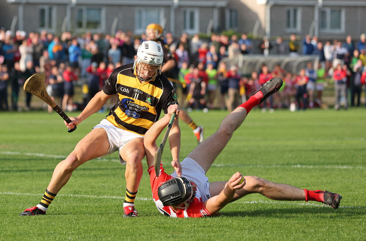  Cillian O'Callaghan, Imokilly, holds onto the sliothar despite the pressure from Eoin Carey, Avondhu. Picture: Jim Coughlan.