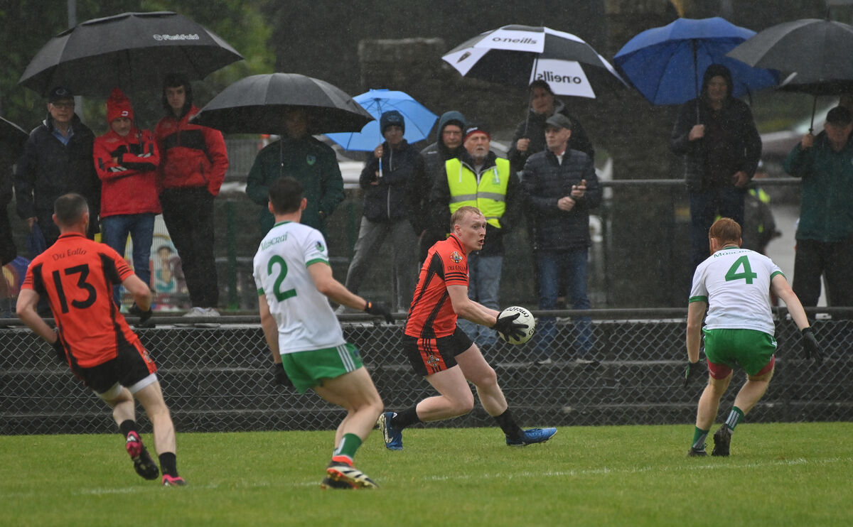 Jack Curtin, Duhallow finds his path blocked by Muskerry players Mark Corrigan and William Ronan in the McCarthy Insurance Group Senior Football Divisional/Colleges final at Ballydesmond. Picture: Dan Linehan Jack Curtin, Duhallow finds his path blocked by Muskerry players Mark Corrigan and William Ronan in the McCarthy Insurance Group Senior Football Divisional/Colleges final at Ballydesmond. Picture: Dan Linehan
