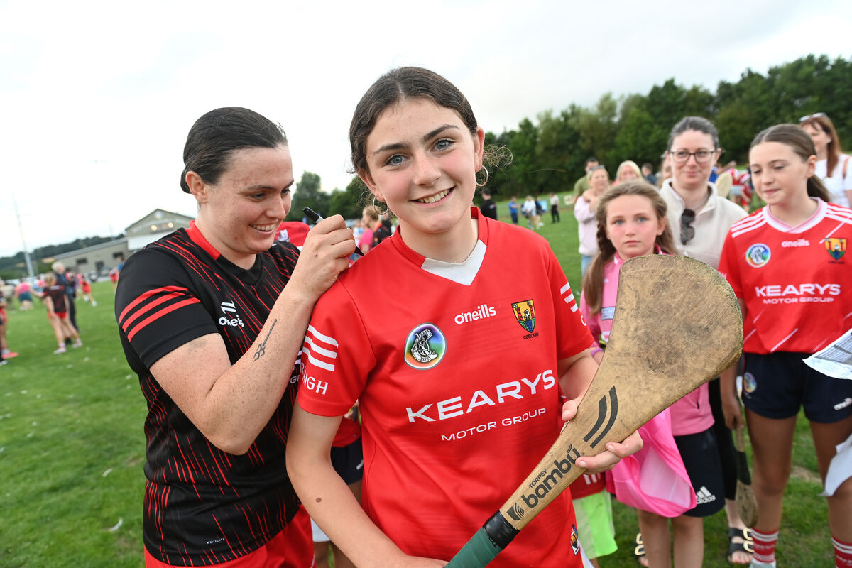  Future star Millie Ryan of Inniscarra Camogie Club gets her jersey signed by her hero Hannah Looney. Picture: Larry Cummins
