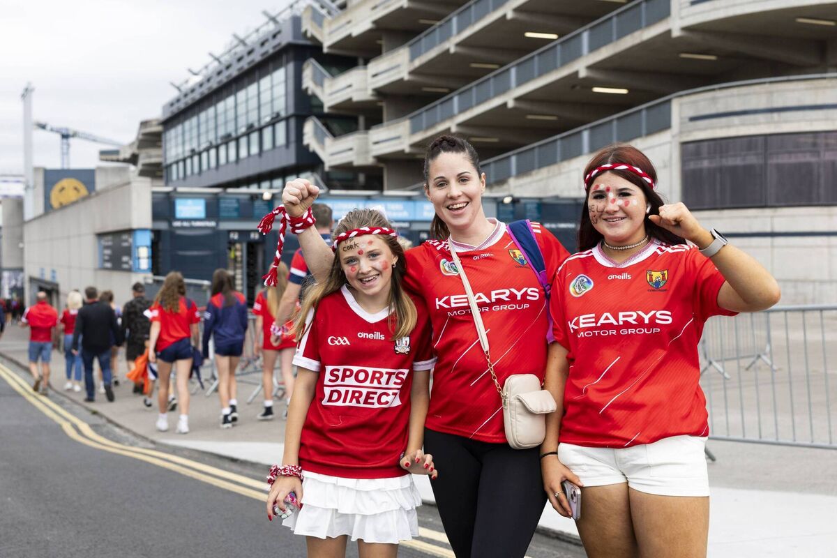 Cork fans Katie Rose (11), mum Barbra Doyle and Lottie Terry (14) outside Croke Park ahead of the All Ireland Camogie Snr Final with Galway vs Cork. Photo: Sam Boal/Collins photos