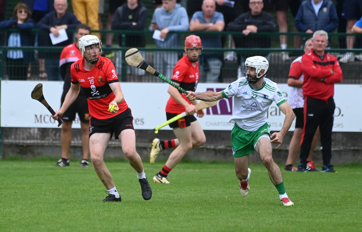 Daniel Twomey in action for UCC as Mukserry's William Aherne attempts a block. Picture: Larry Cummins Daniel Twomey in action for UCC as Mukserry's William Aherne attempts a block. Picture: Larry Cummins