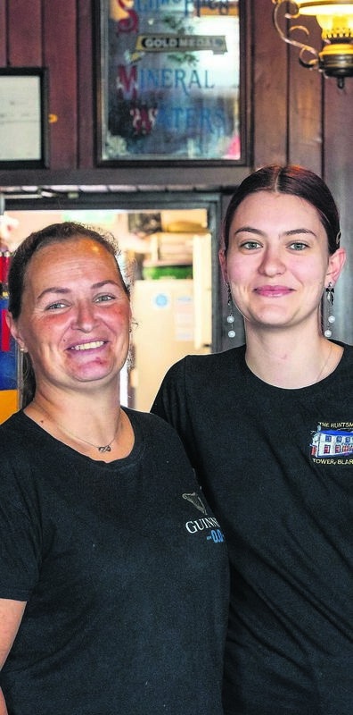 The Huntsman owner Terry McCann’s daughter Julie, alongside staff member Alex Gazda.  	Pictures by Noel Sweeney
                    
