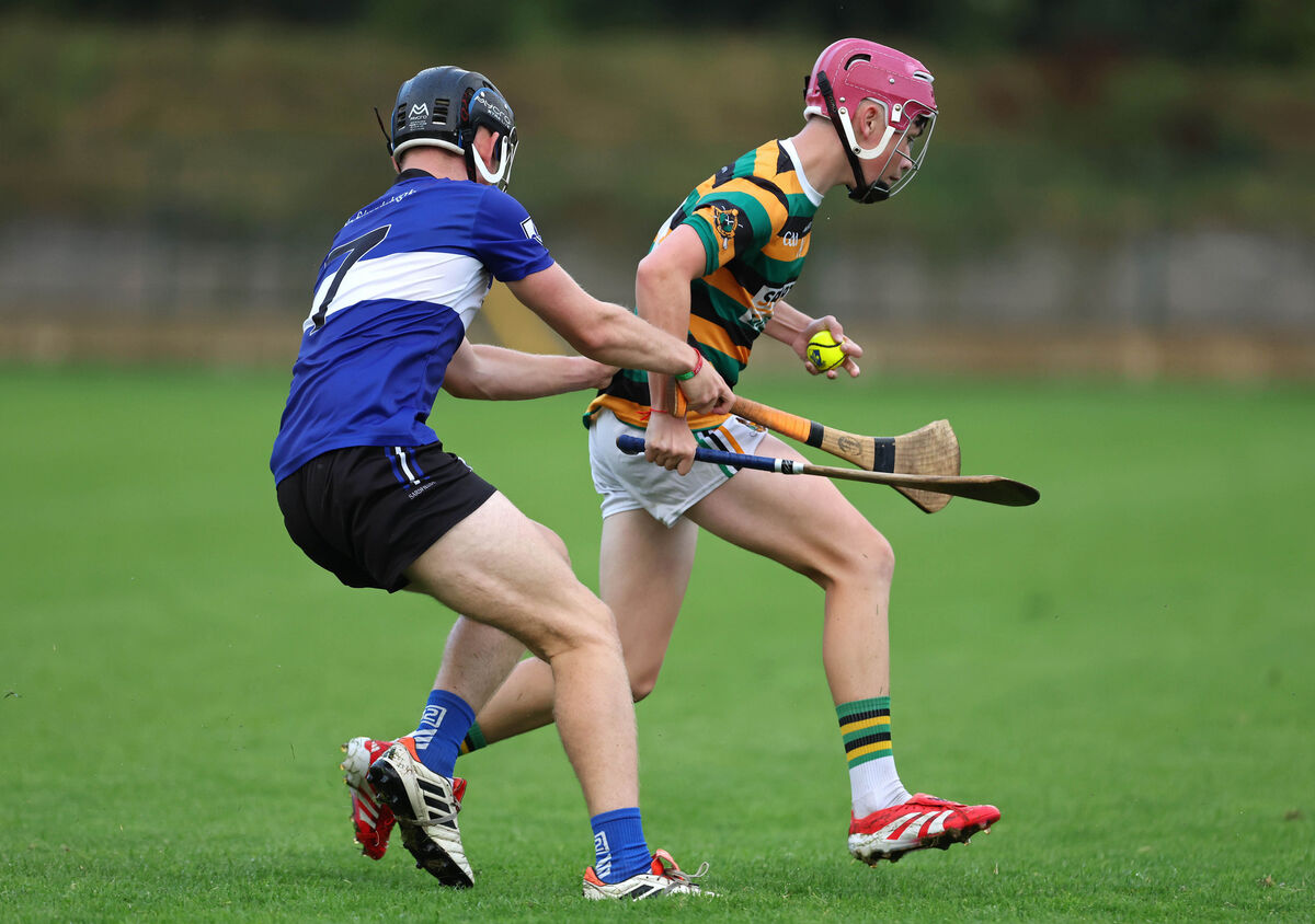  Kevin Murphy, Sarsfields, tackles Daniel Heffernan, Glen Rovers. Picture: Jim Coughlan.