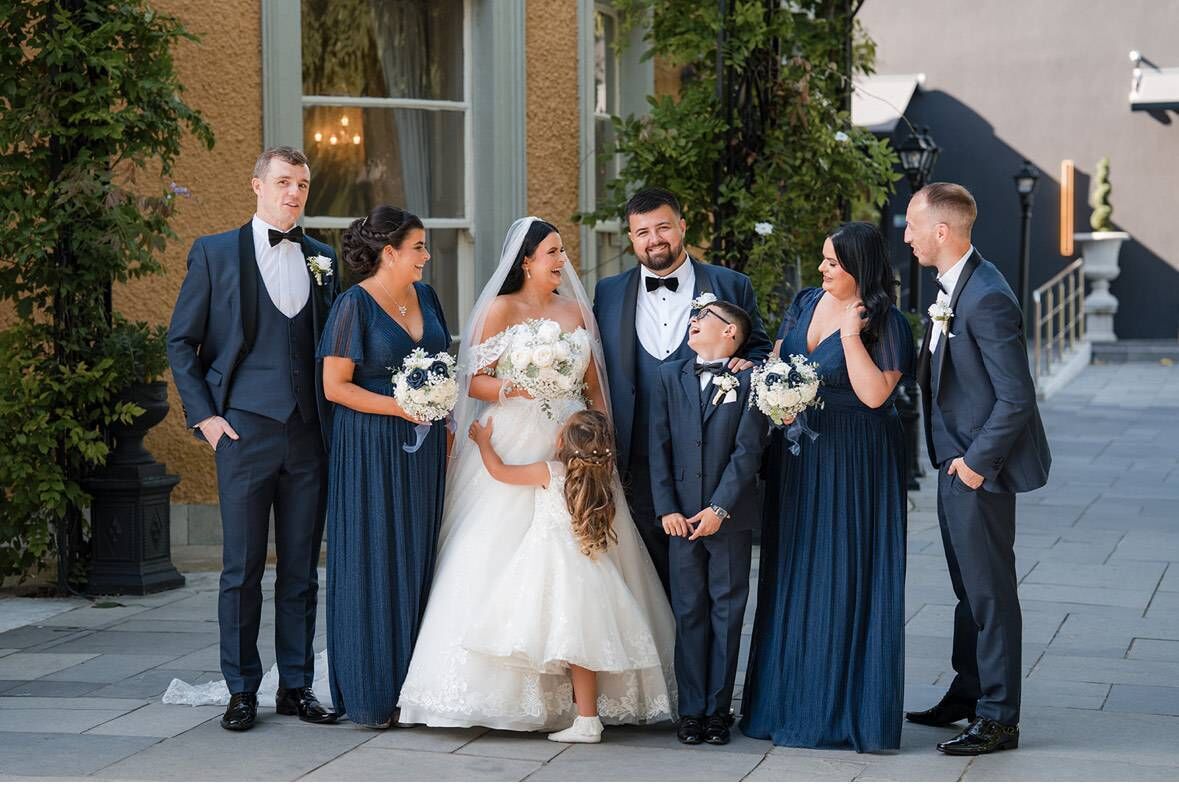 Shannon and Daniel with their bridesmaids, groomsmen, and children, Charlie and Bonnie. Shannon and Daniel with their bridesmaids, groomsmen, and children, Charlie and Bonnie.