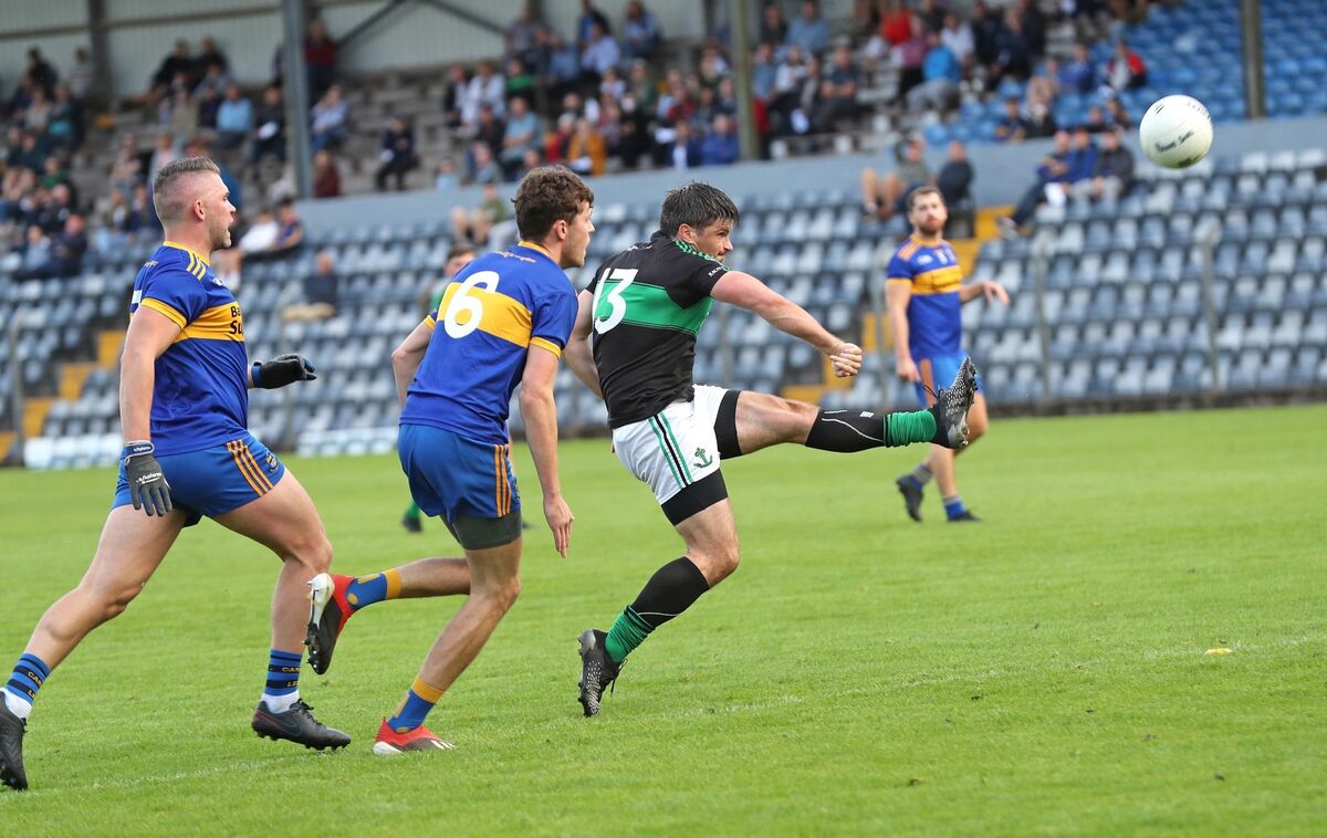 Barry O'Driscoll, Nemo Rangers, gets away from Stephen Dwane and Kevin Kavanagh, Carrigaline during their 2021 Cork PSFC group stage clash at Páirc Uí Rinn. Picture: Jim Coughlan. Barry O'Driscoll, Nemo Rangers, gets away from Stephen Dwane and Kevin Kavanagh, Carrigaline during their 2021 Cork PSFC group stage clash at Páirc Uí Rinn. Picture: Jim Coughlan.