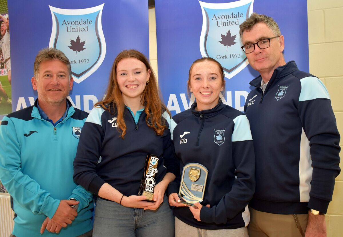 Avondale Under 19 Ladies Player of the Year, Elizabeth Murphy and Clubperson of the Year, Elle O'Donovan receiving their trophies from coaches, Mark Riordan and John McCarthy at the club's awards night.