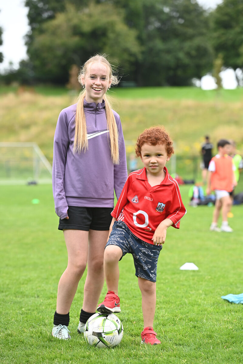  Mia Mulconroy, coach with camp participant Conor at the Avondale United Summer Soccer camp, run by Coerver Coaching, at Beaumont Park, Ballintemple, Cork.  Pic: Larry Cummins