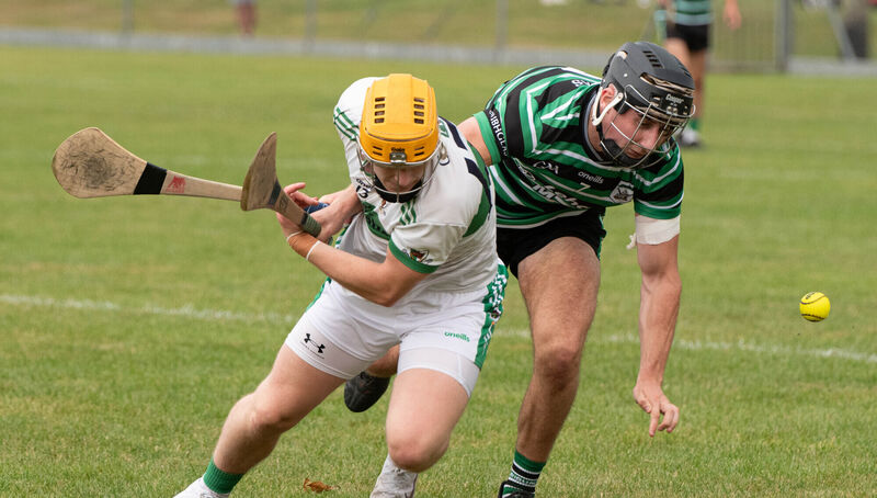 Kanturk's Rory Sheahan clashes with James O'Callaghan-Maher of Douglas. Picture: Howard Crowdy