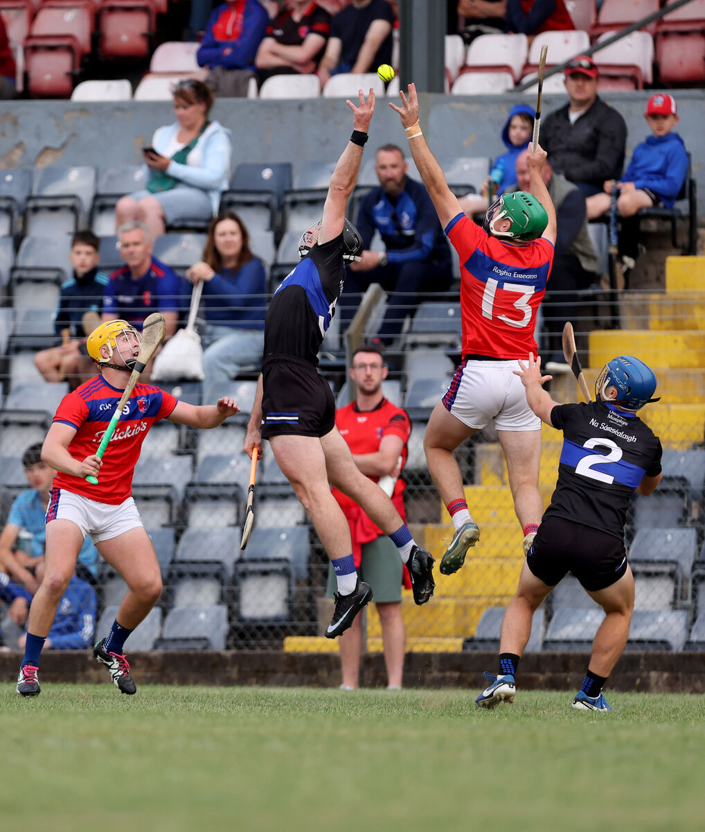 Bryan Murphy, Sarsfields, Conor Lenihan, Erins Own contest the high ball. Picture: Jim Coughlan. Bryan Murphy, Sarsfields, Conor Lenihan, Erins Own contest the high ball. Picture: Jim Coughlan.
