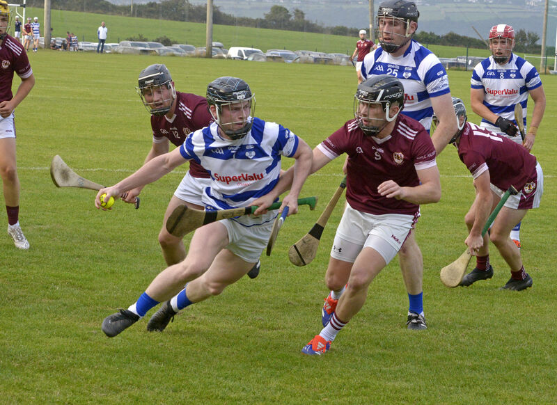 Inniscarra's Cormac Dineen breaks through. Picture: Denis Boyle Inniscarra's Cormac Dineen breaks through. Picture: Denis Boyle