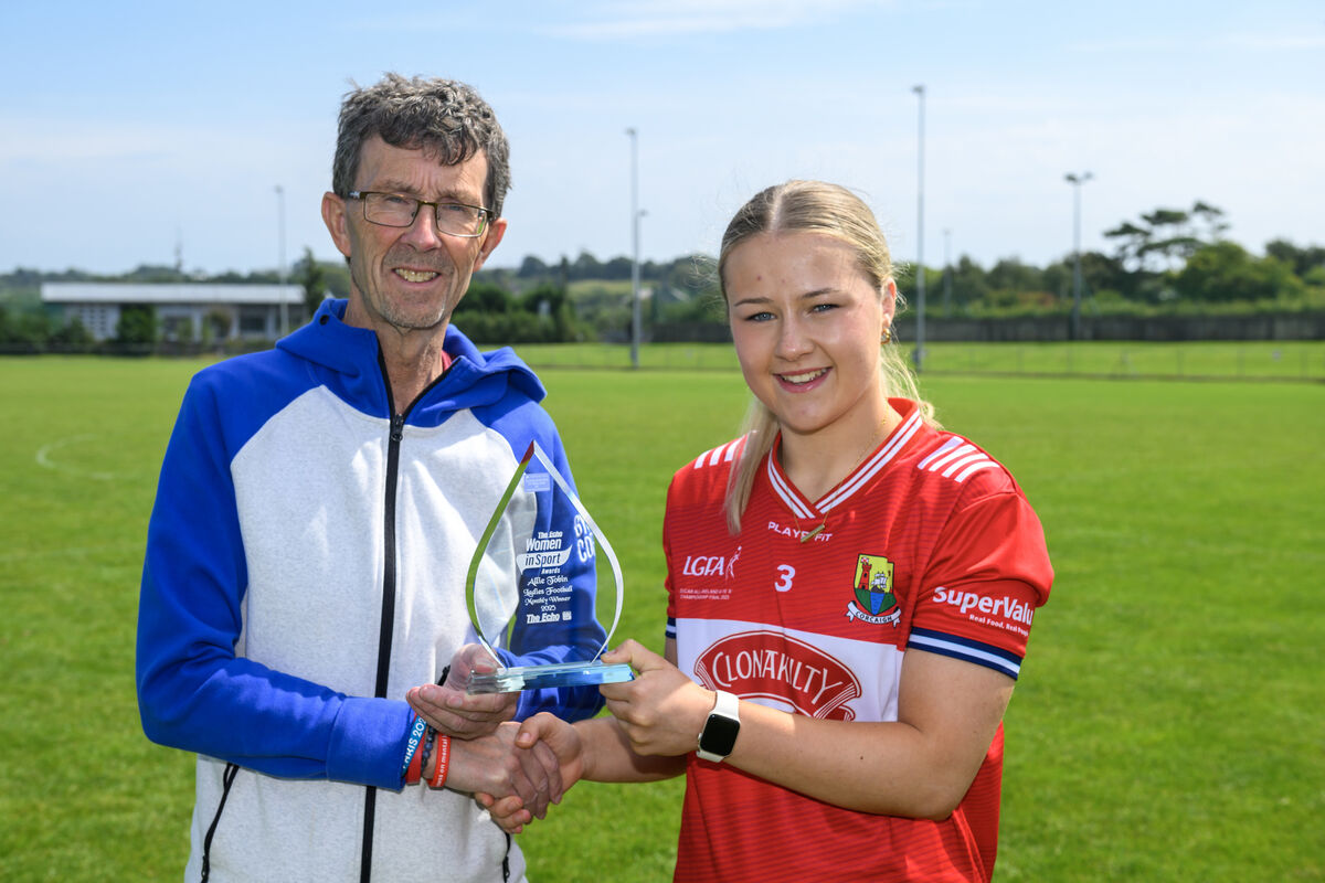 Rory Noonan, Chief Sub-Editor, The Echo, presents Allie Tobin with her The Echo Women in Sport monthly award. Picture: Dan Linehan