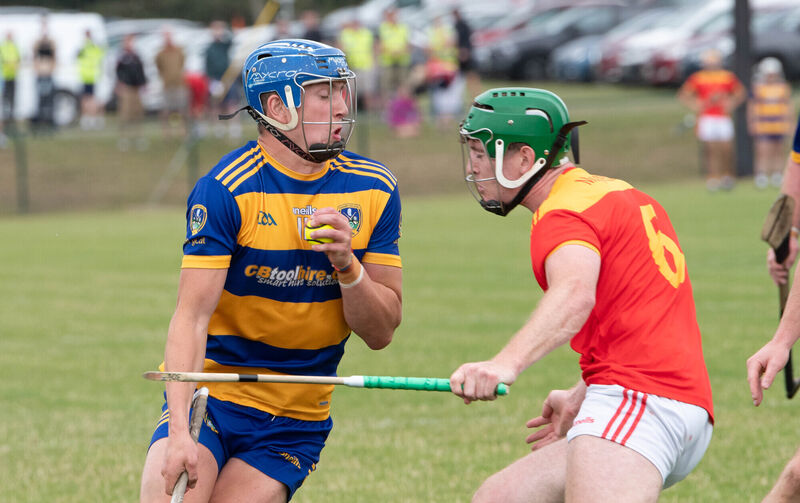 Lisgoold's Diarmuid Healy about to be confronted by Mallow's Ronan Sheehan during the PIHC match in Castlelyons. Picture: Howard Crowdy