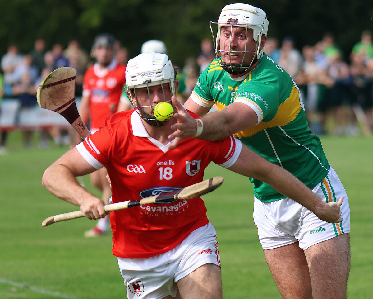 Darren Casey of Charleville tries to hold off Newtownshandrum's Tim O'Mahony. Picture@ Brendan Gleeson Darren Casey of Charleville tries to hold off Newtownshandrum's Tim O'Mahony. Picture@ Brendan Gleeson