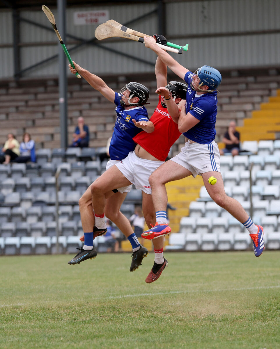 Patrick O'Leary and Kevin Maguire of Ballinhassig, battle for the ball with Joe Stack of Castlemartyr. Picture: Jim Coughlan Patrick O'Leary and Kevin Maguire of Ballinhassig, battle for the ball with Joe Stack of Castlemartyr. Picture: Jim Coughlan