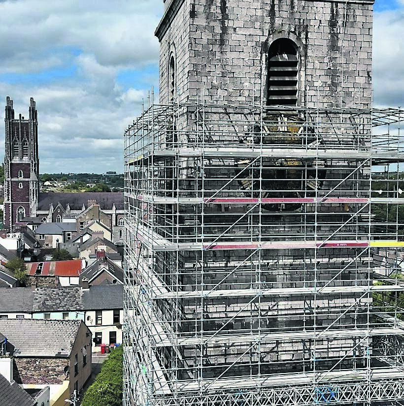 Work on the four clock faces and the bells of Shandon steeple at the Church of St Anne, Shandon, is underway with scaffolding in position at the famous Cork landmark.	Picture: Larry Cummins
                    