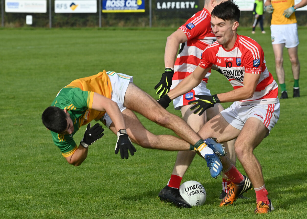  Denis Collins, Adrigole, gets the better of Gerry O'Sullivan of Boherbue last season. Picture: Dan Linehan