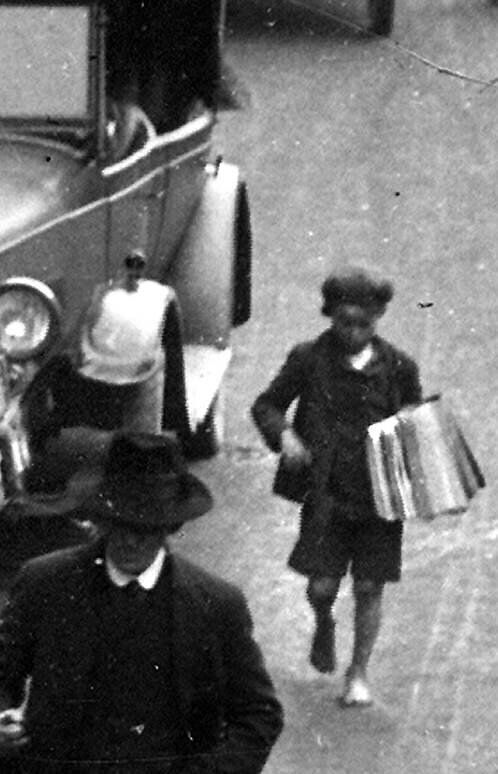 A barefoot Echo Boy on Patrick Street in Cork city in Decembe, 1927