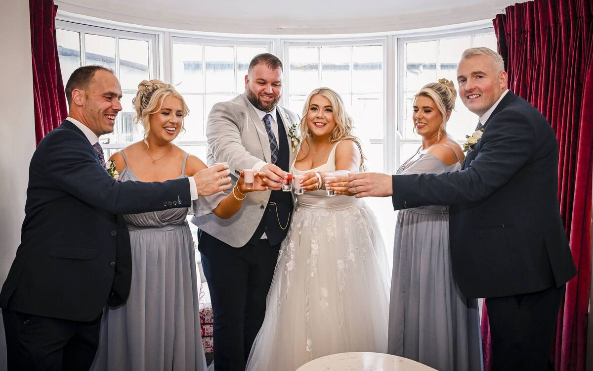 The couple's bridal party was “filled with people that we adore”, the bride said. The couple's bridal party was “filled with people that we adore”, the bride said.