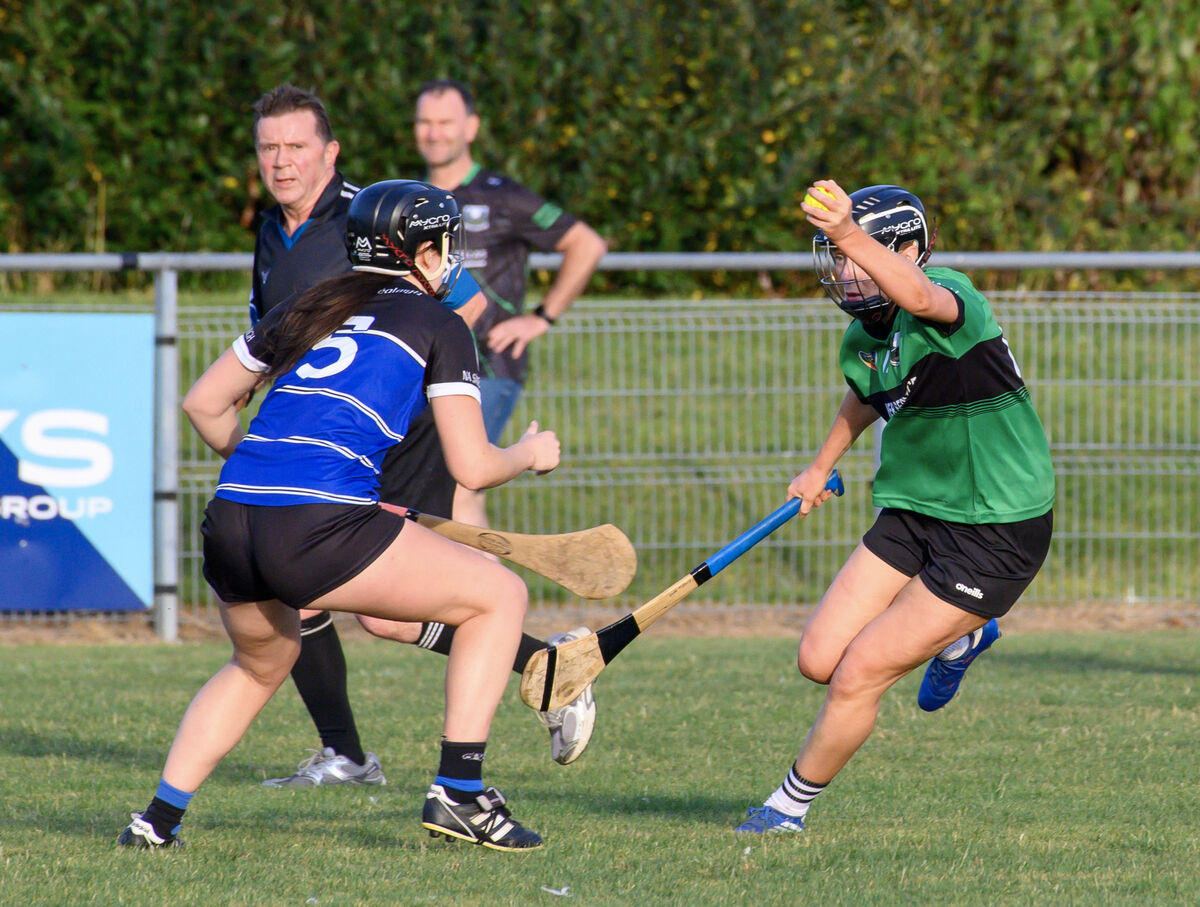  Tara Elliott, Sarsfields, looking to block the breaking Laura Treacy of Killeagh. Picture: Dan Linehan