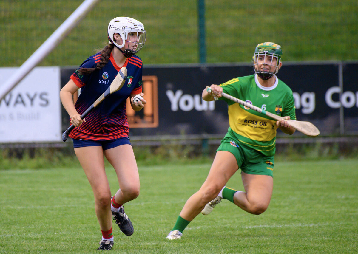  Julia Mehigan, Ballinora, looking for a way past Aoife Barry Murphy, Cloughduv. Picture: Dan Linehan