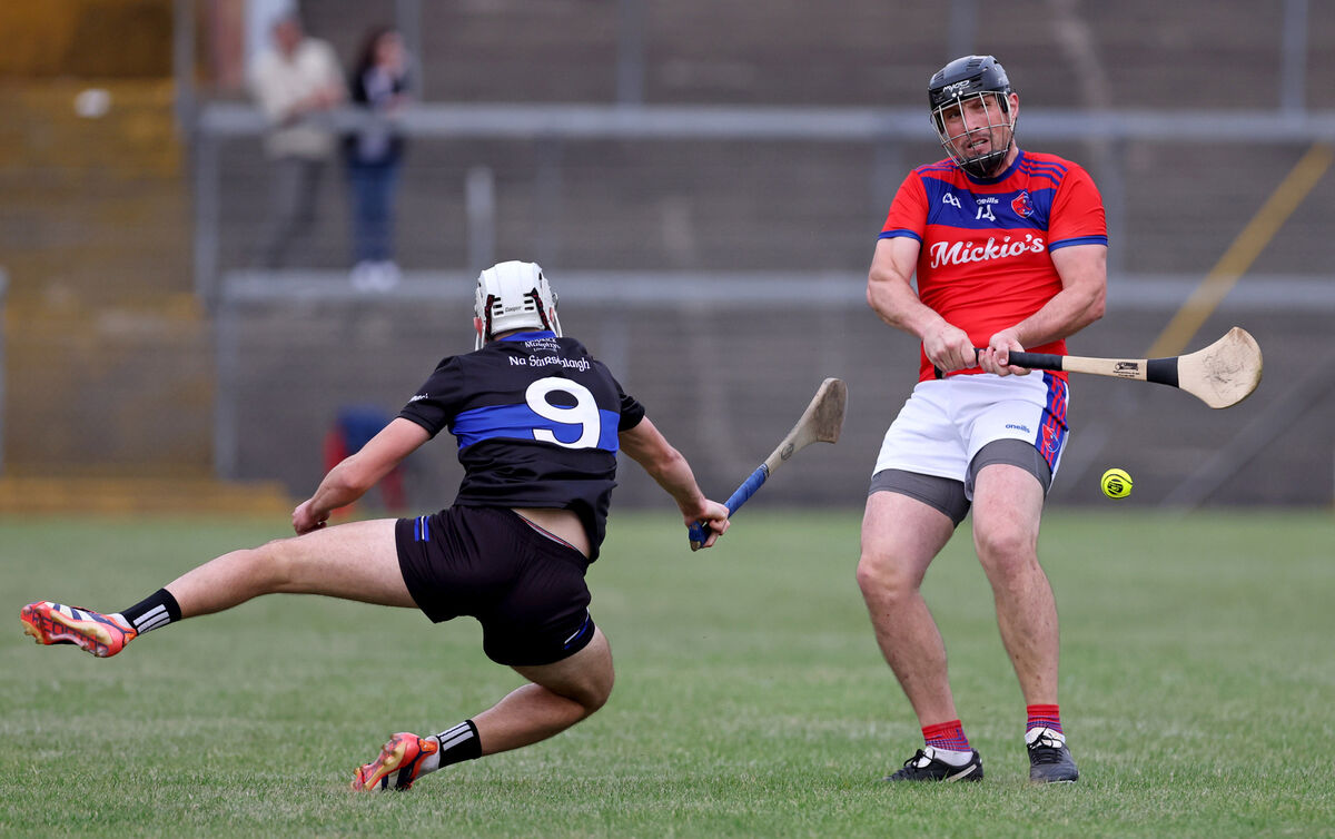  Killian Murphy, Sarsfields, tries to block Eoghan Murphy, Erins Own during the Cork County Premier Senior Hurling Championship at Pairc Ui Rinn. Picture: Jim Coughlan.