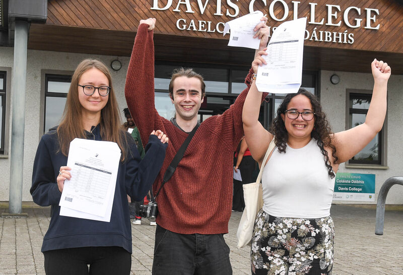  Vakare Visalgaite, Noah Cahill and Emily Ramsamy, looking happy after receiving their Leaving Cert results at Davis College in Mallow, Co Cork. Picture: David Keane.