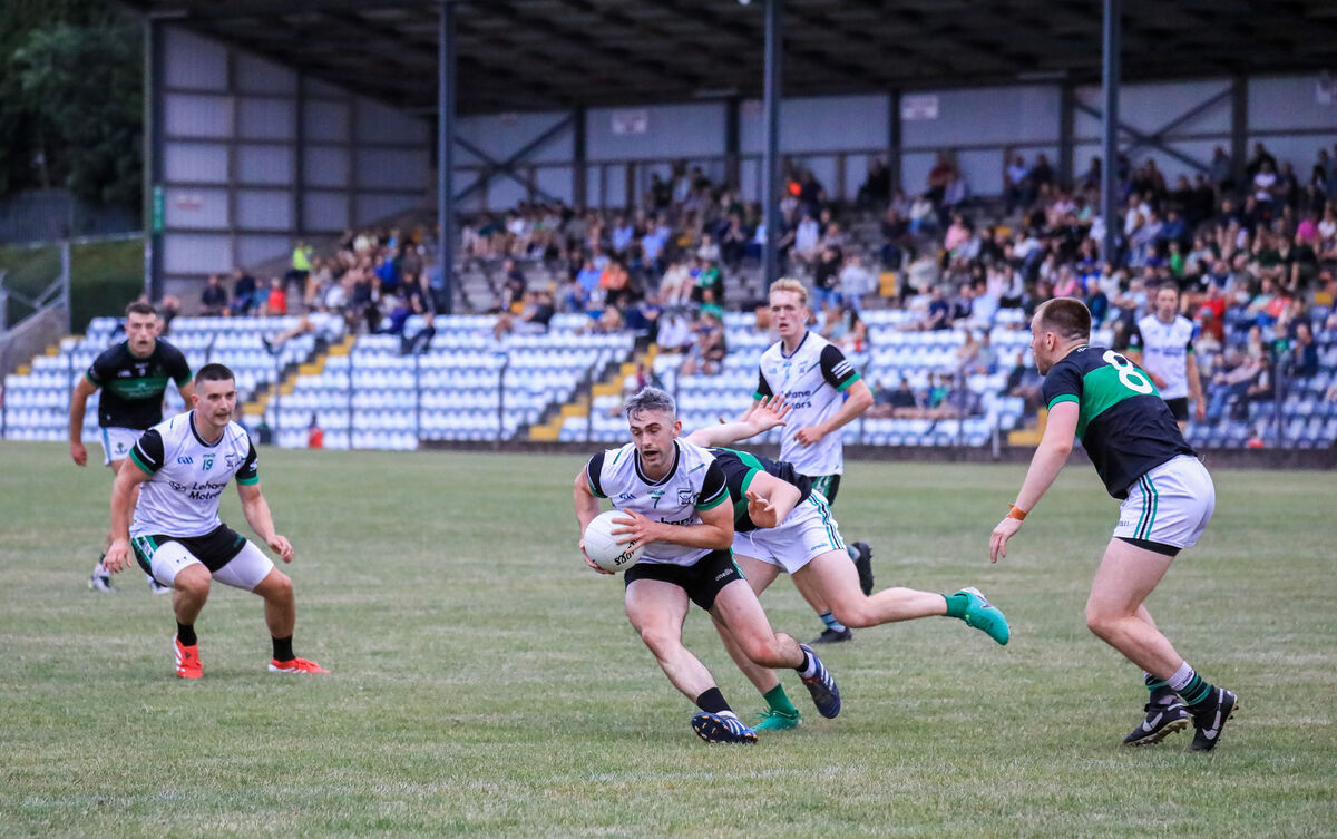 Douglas' Conor Kingston in action against Nemo's Mark Hill. Picture: David Creedon Douglas' Conor Kingston in action against Nemo's Mark Hill. Picture: David Creedon