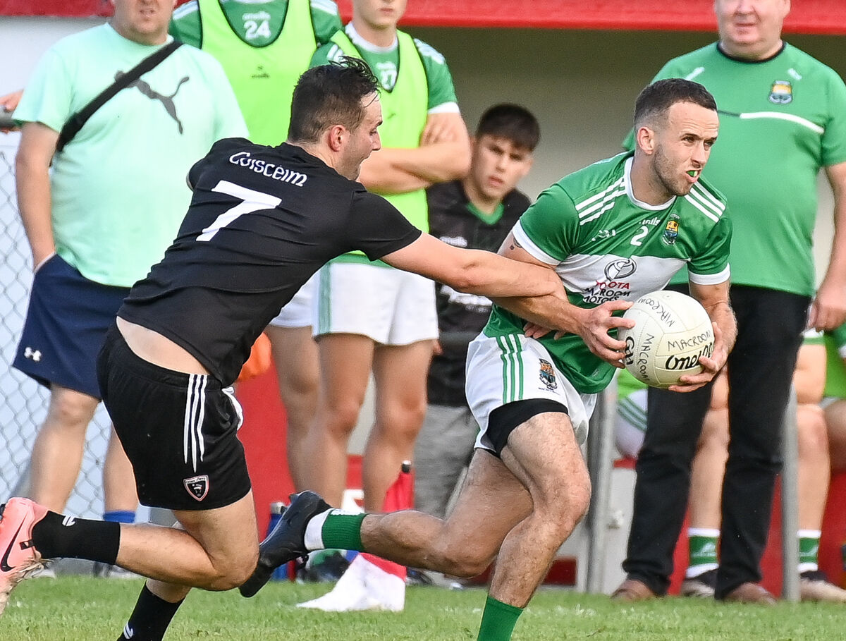 Macroom's Michael Cronin tries to get away from Kiskeam's Kieran O'Connor. Picture: David Keane. Macroom's Michael Cronin tries to get away from Kiskeam's Kieran O'Connor. Picture: David Keane.