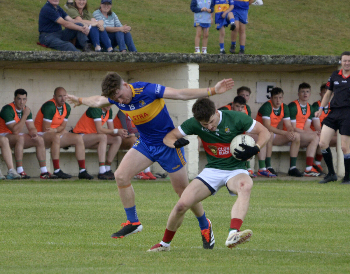 Clonakilty's Dan Darragh being tackled by Carrigaline's Éanna Desmond. Picture: Denis Boyle Clonakilty's Dan Darragh being tackled by Carrigaline's Éanna Desmond. Picture: Denis Boyle