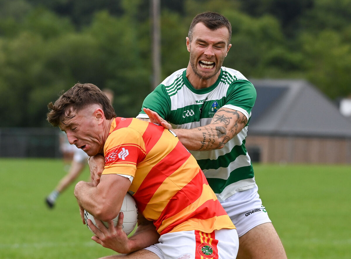 Newcestown's Colm O'Donovan is strongly challenged by Valley Rovers' Fiachra Lynch, during their Premier SFC clash at Kilmurry. Picture: David Keane. Newcestown's Colm O'Donovan is strongly challenged by Valley Rovers' Fiachra Lynch, during their Premier SFC clash at Kilmurry. Picture: David Keane.
