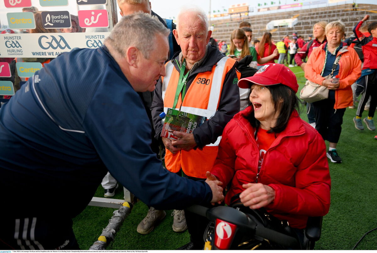 Pat Ryan is congratulated by Ita Fitzgibbon after Cork's win over Limerick in the Munster SHC final at TUS Gaelic Grounds. Picture: Ray McManus/Sportsfile