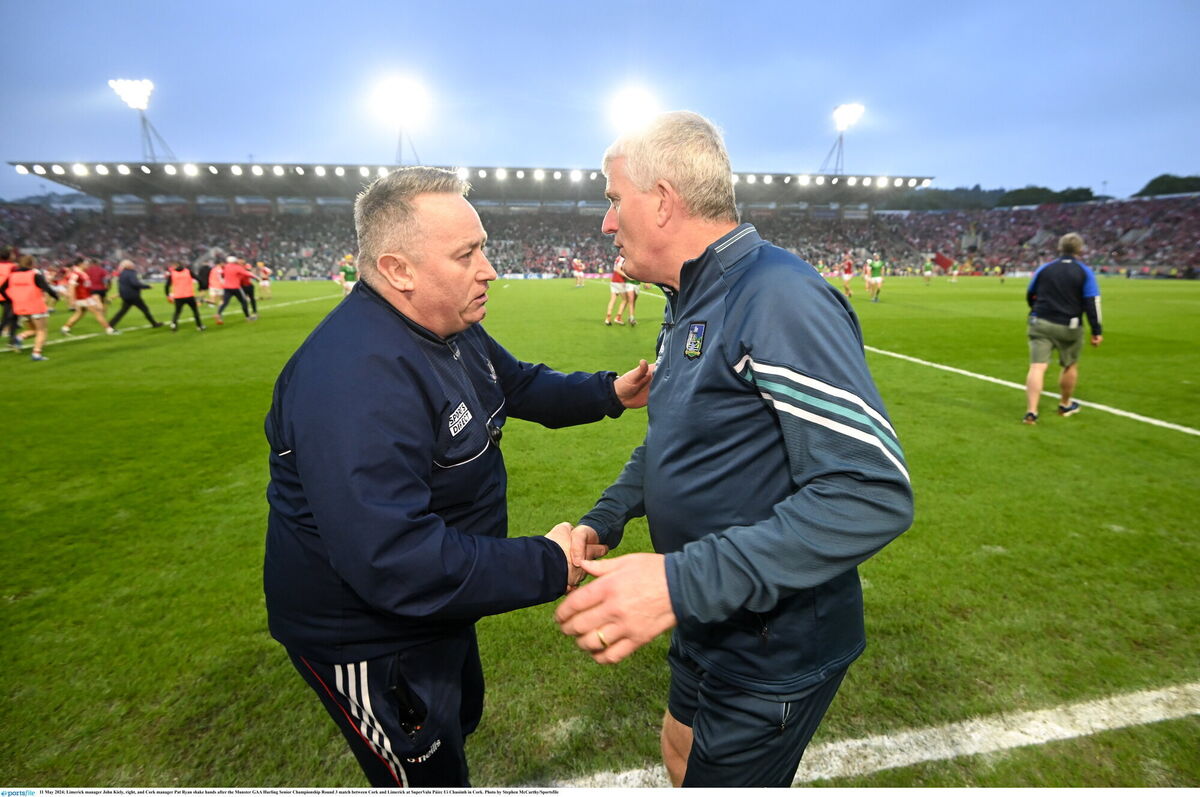Pat Ryan shakes hands with John Kiely after Cork's win over Limerick at SuperValu Páirc Uí Chaoimh in May 2024. Picture: Stephen McCarthy/Sportsfile