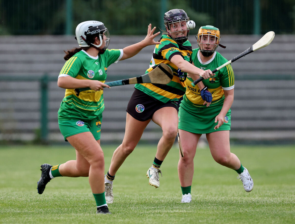  Tara McCarthy, Glen Rovers, tackles Ciara Hughes and Mairead Corkery, Cloughduv, at MTU Stadium. Picture: Jim Coughlan.