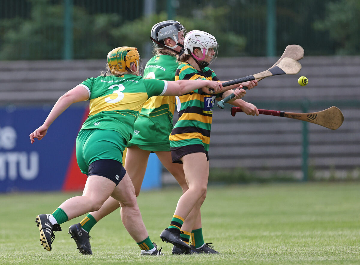  Sophie O'Sullivan, Glen Rovers, is under pressure from Niamh O'Leary and Fia Drinan, Cloughduv. Picture: Jim Coughlan.