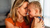 Mother comforting her crying little girl. Parenthood, family, support concept